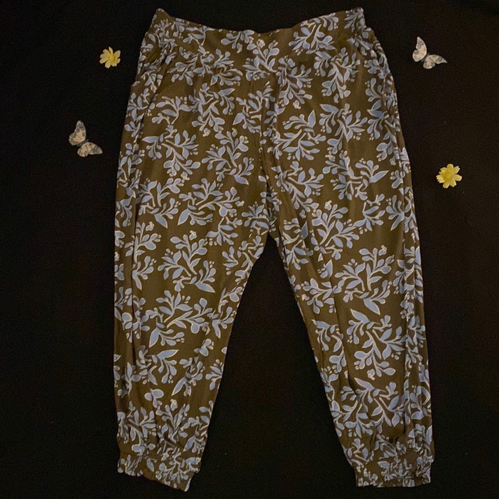 Tan light weight pants with light blue design, bottom leg gathering with pockets